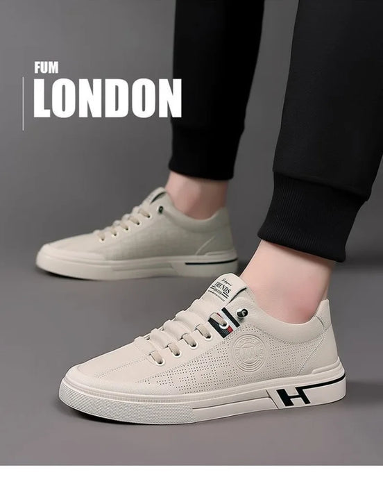 Sneakers da uomo Designer Casual scarpe traspiranti goffrate in pelle leggera scarpe da Skateboard versatili morbide Zapatillas Hombre